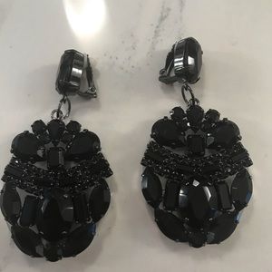 Large black glass ear rings. Clip on.